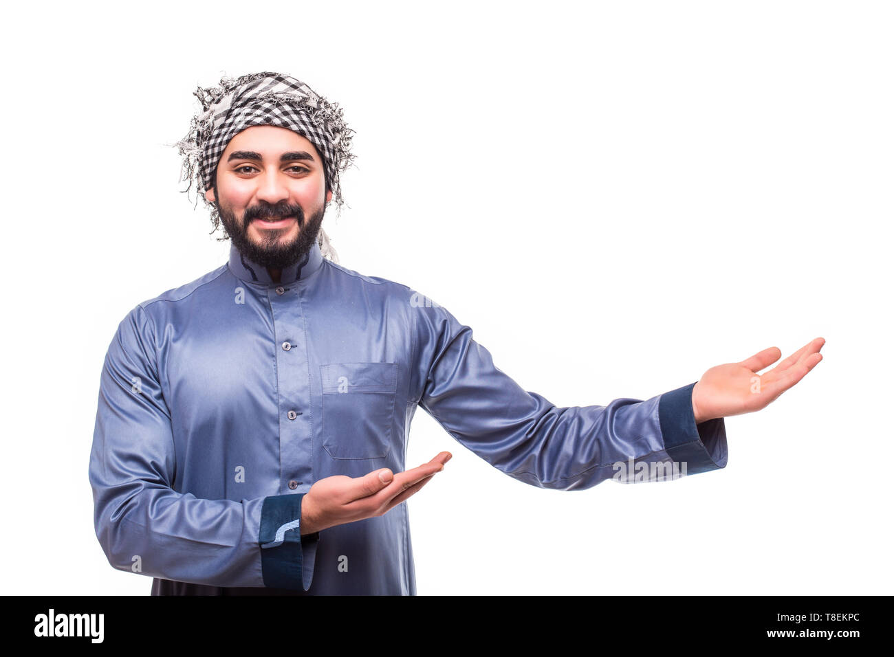 Young egypt man wearing white thobe isolated on a white background. Stock Photo
