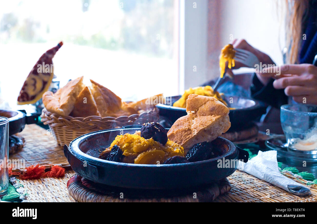 tajine with meat plum almond and sesame seeds. Marocco Stock Photo