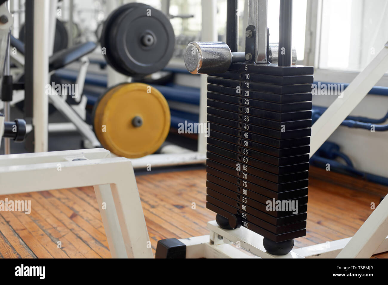 Gym equipment background. Weight stack in modern gym. Interior of ...
