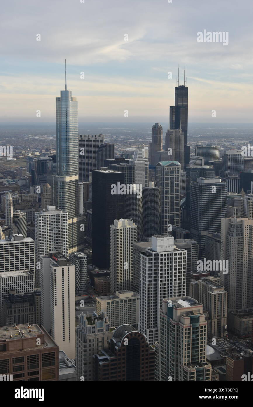 Chicago at sunset as seen from above at 360 Chicago atop the John Hancock Center, Near North Side, Magnificent Mile, Chicago, Illinois, USA Stock Photo