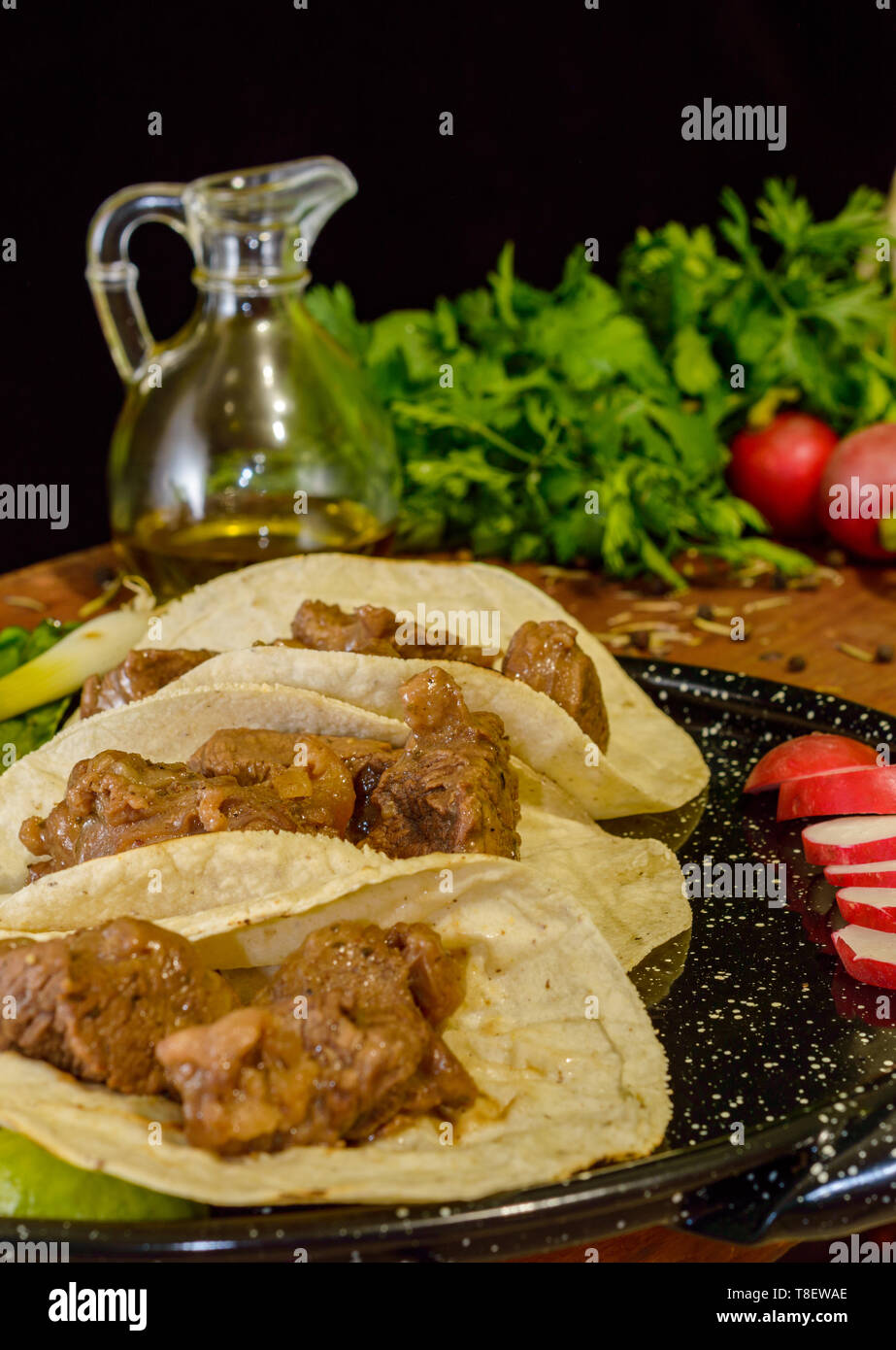 Arrachera beef tacos, Mexican food made with beer marinade and corn tortillas with copy space Stock Photo