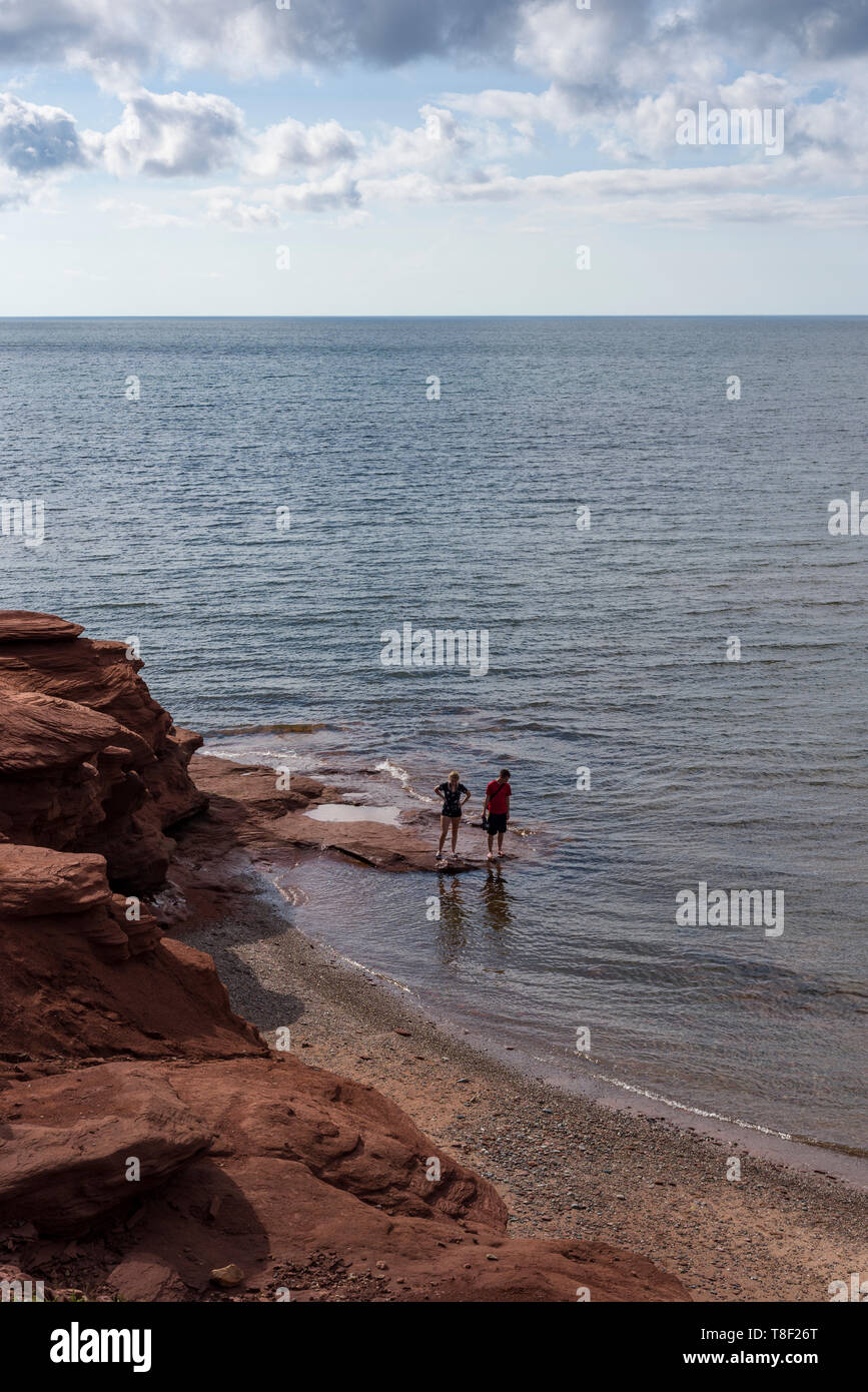 Miles of sand dunes, barrier islands, sandstone cliffs, wetlands, and forests. The beaches of Cavendish are part of Prince Edward Island National Park Stock Photo