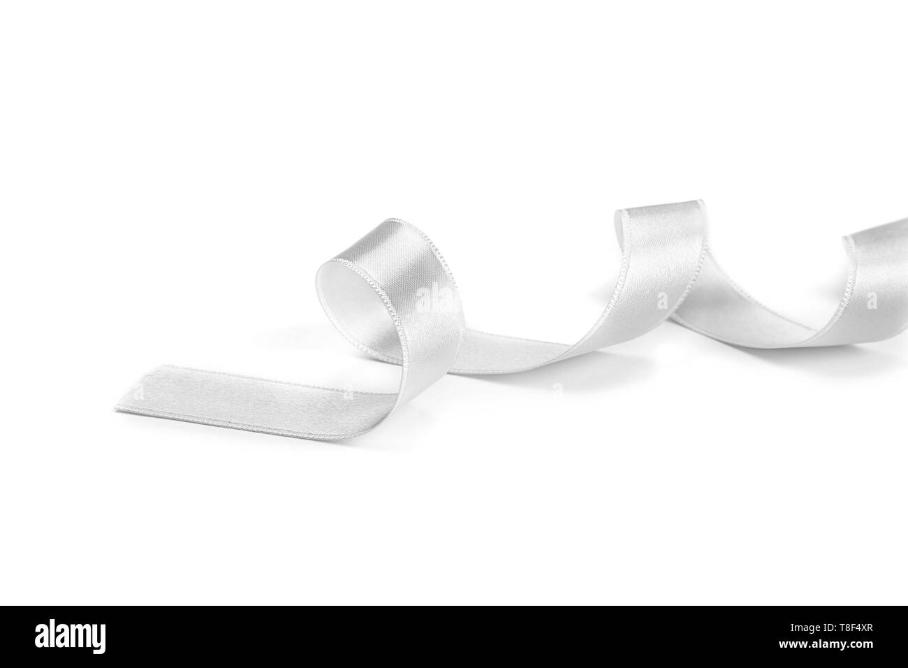 Silver ribbon on white background Stock Photo - Alamy