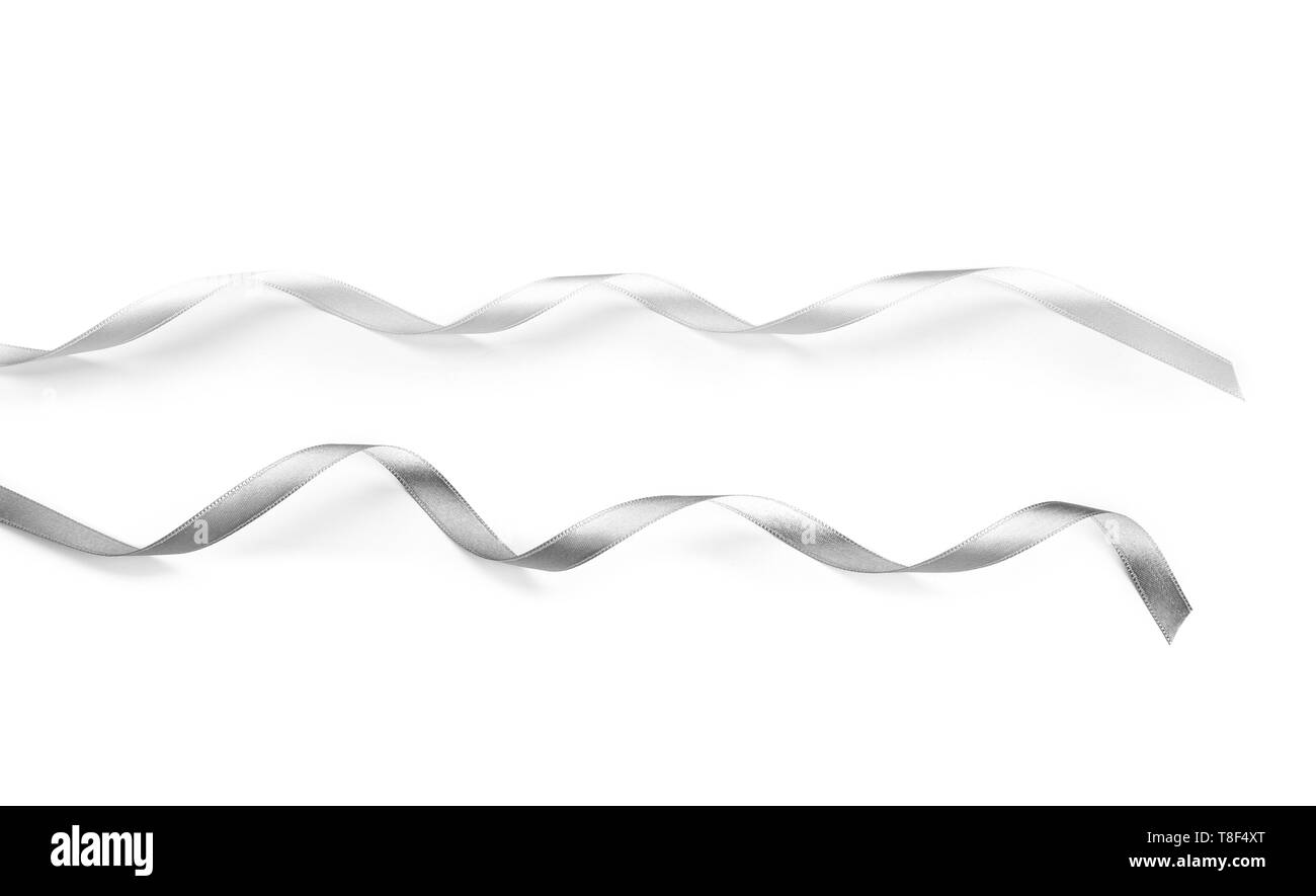 Silver ribbons on white background Stock Photo - Alamy