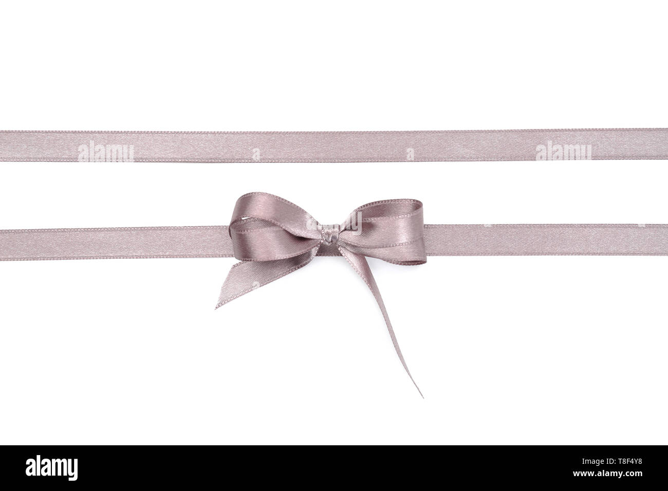 Silver ribbons with bow on white background Stock Photo - Alamy