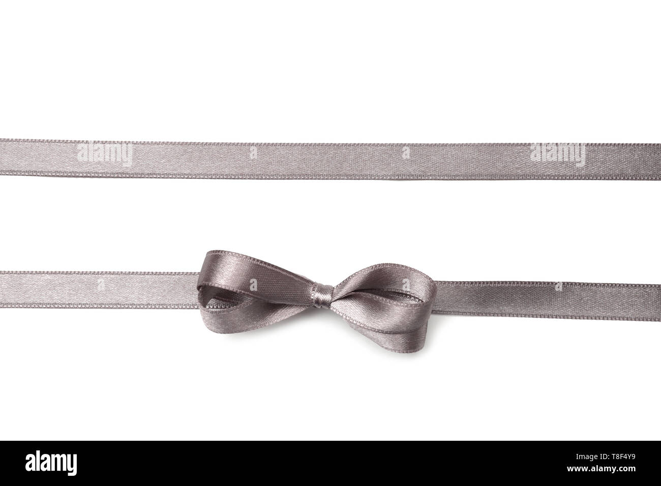 Silver ribbons with bow on white background Stock Photo - Alamy