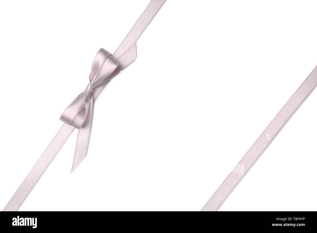 Silver ribbons with bow on white background Stock Photo - Alamy