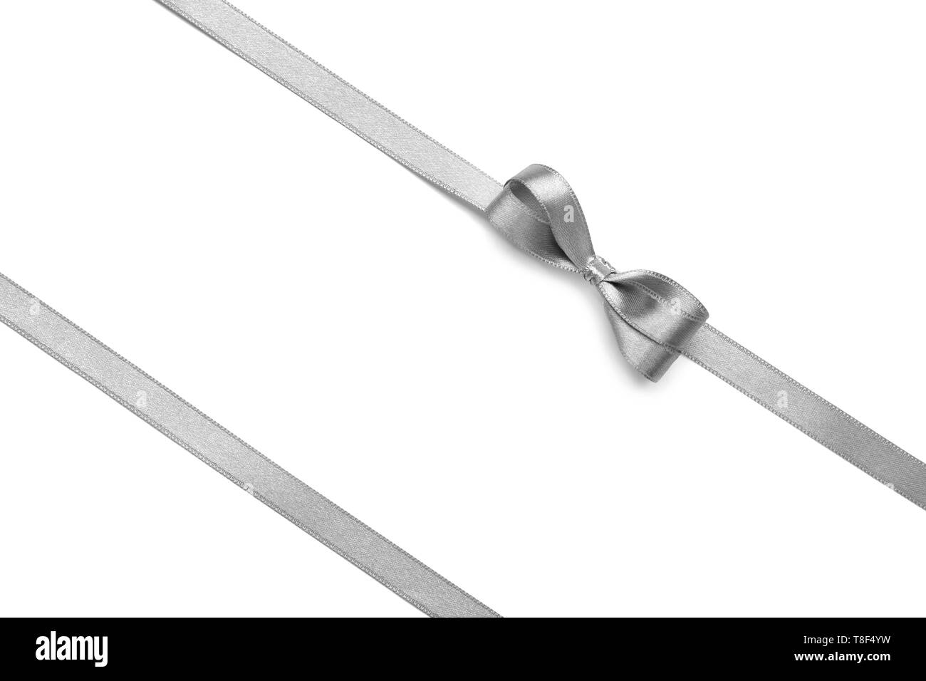 Silver ribbons with bow on white background Stock Photo - Alamy