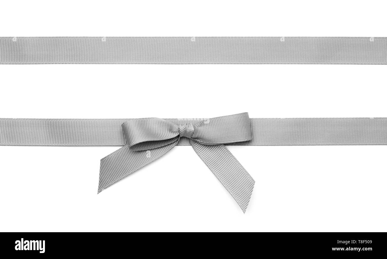 Silver ribbons with bow on white background Stock Photo - Alamy