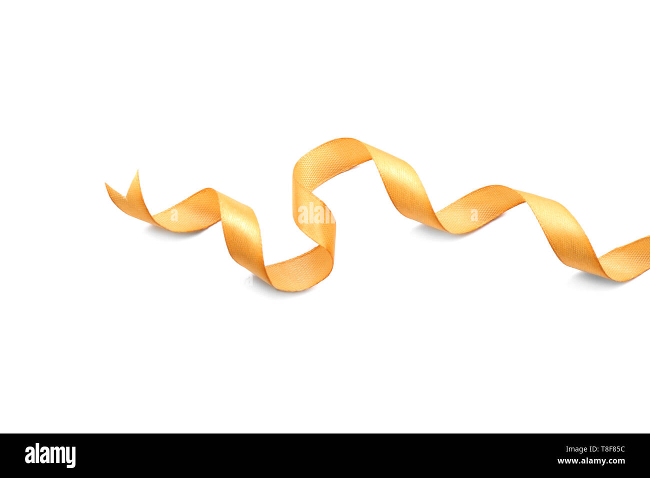 Beautiful golden ribbon on white background Stock Photo - Alamy