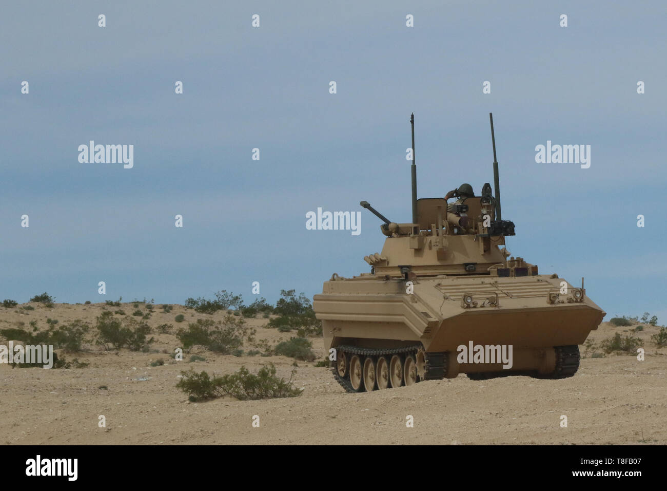 11th Armored Cavalry Trooper stand their ground against the incoming elements of the 2nd Armored Brigade Combat Team, 1st Cavalry Division, National Training Center, Calif., April 11th, 2019. This defense will test the 2/1 ABCT Cav’s ability to attack and hold a foreign city. (U.S. Army Photo By Pv2 James Newsome) Stock Photo
