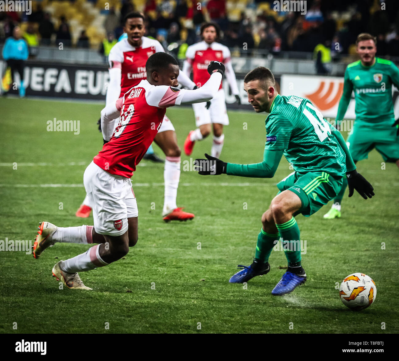 KYIV, UKRAINE - NOVEMBER 29, 2018: Eddie Nketiah of Arsenal (L) fights for a ball with Ardin Dallku of Vorskla Poltava during their UEFA Europa League Stock Photo