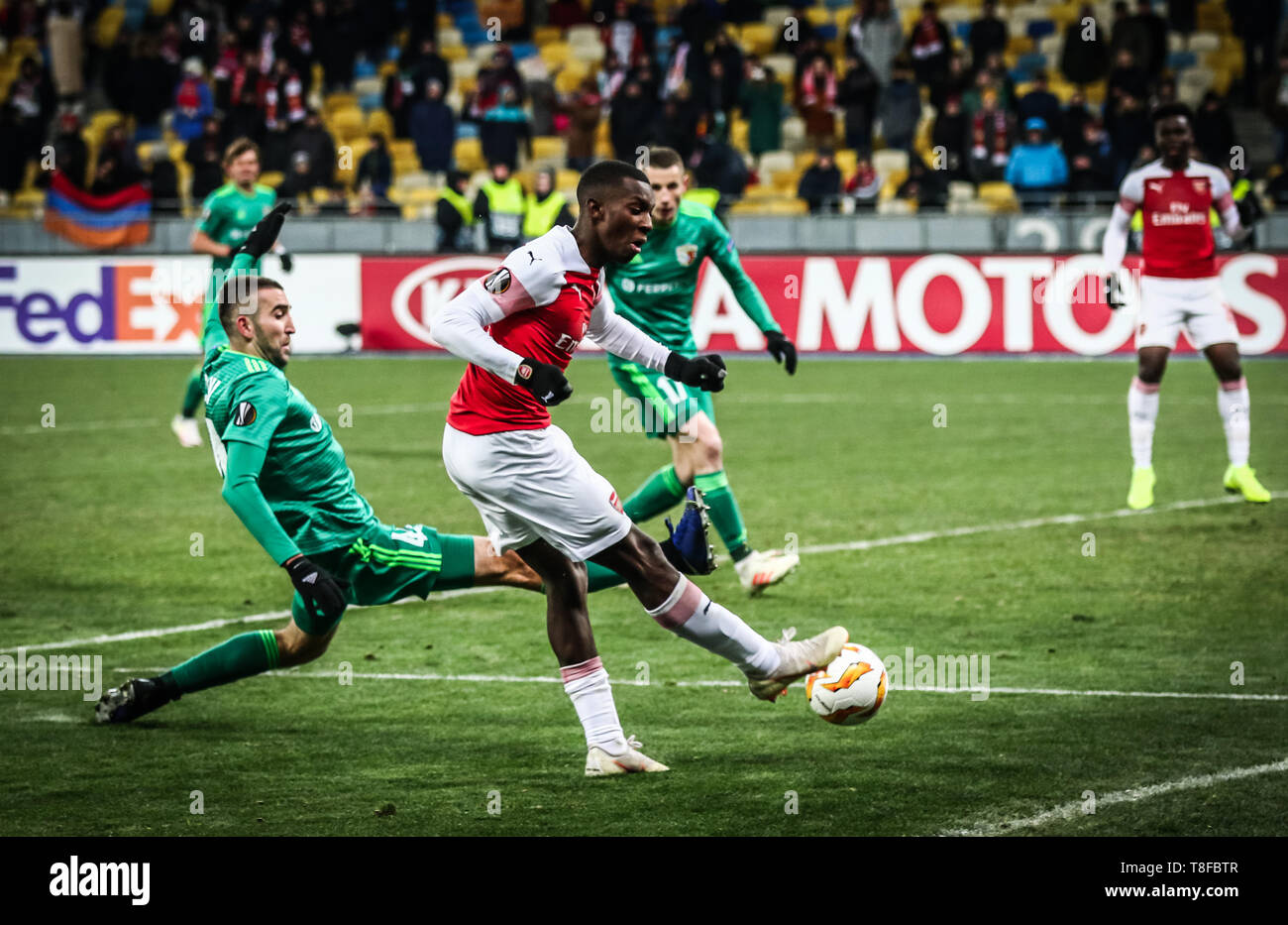 KYIV, UKRAINE - NOVEMBER 29, 2018: Eddie Nketiah of Arsenal (R) fights for a ball with Ardin Dallku of Vorskla Poltava during their UEFA Europa League Stock Photo