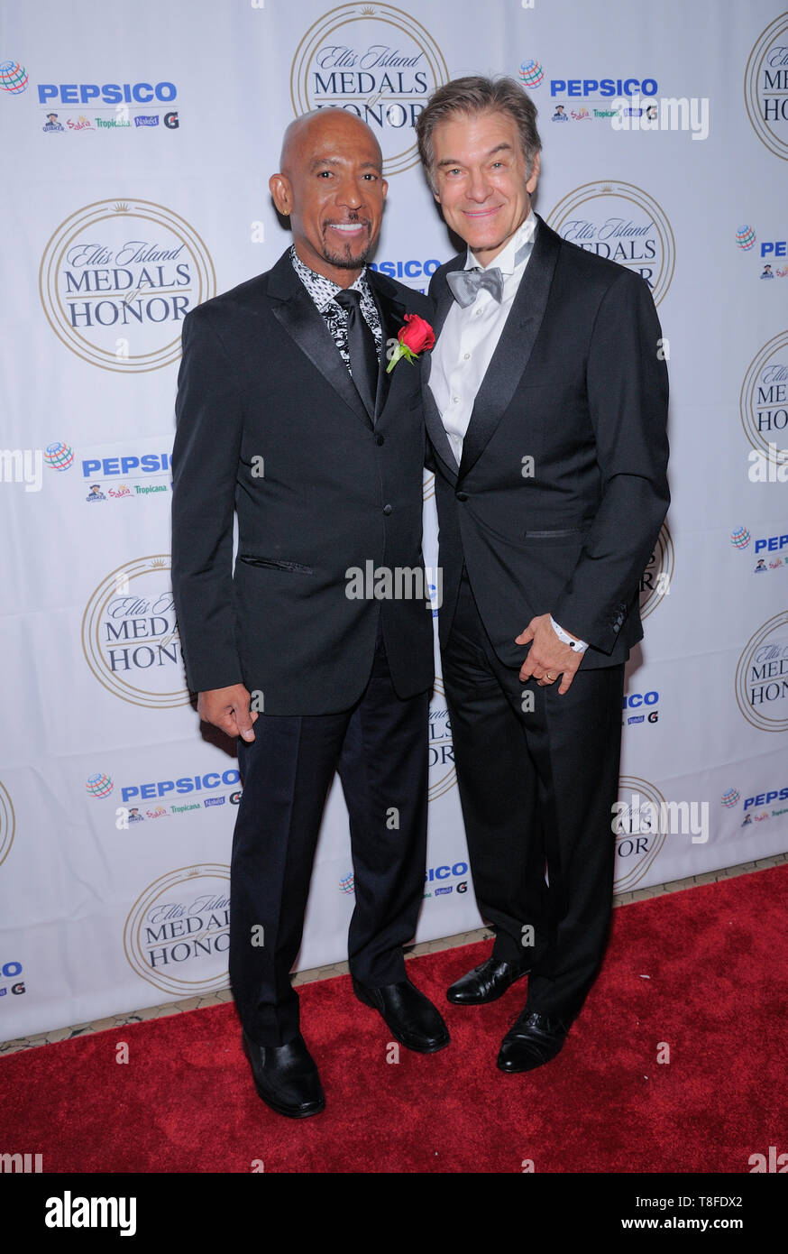 Ellis Island, NY - May 11, 2019: Montel Williams and Mehmet Oz attend the 34th Annual Ellis Island Medals Of Honor Ceremony at Ellis Island Stock Photo