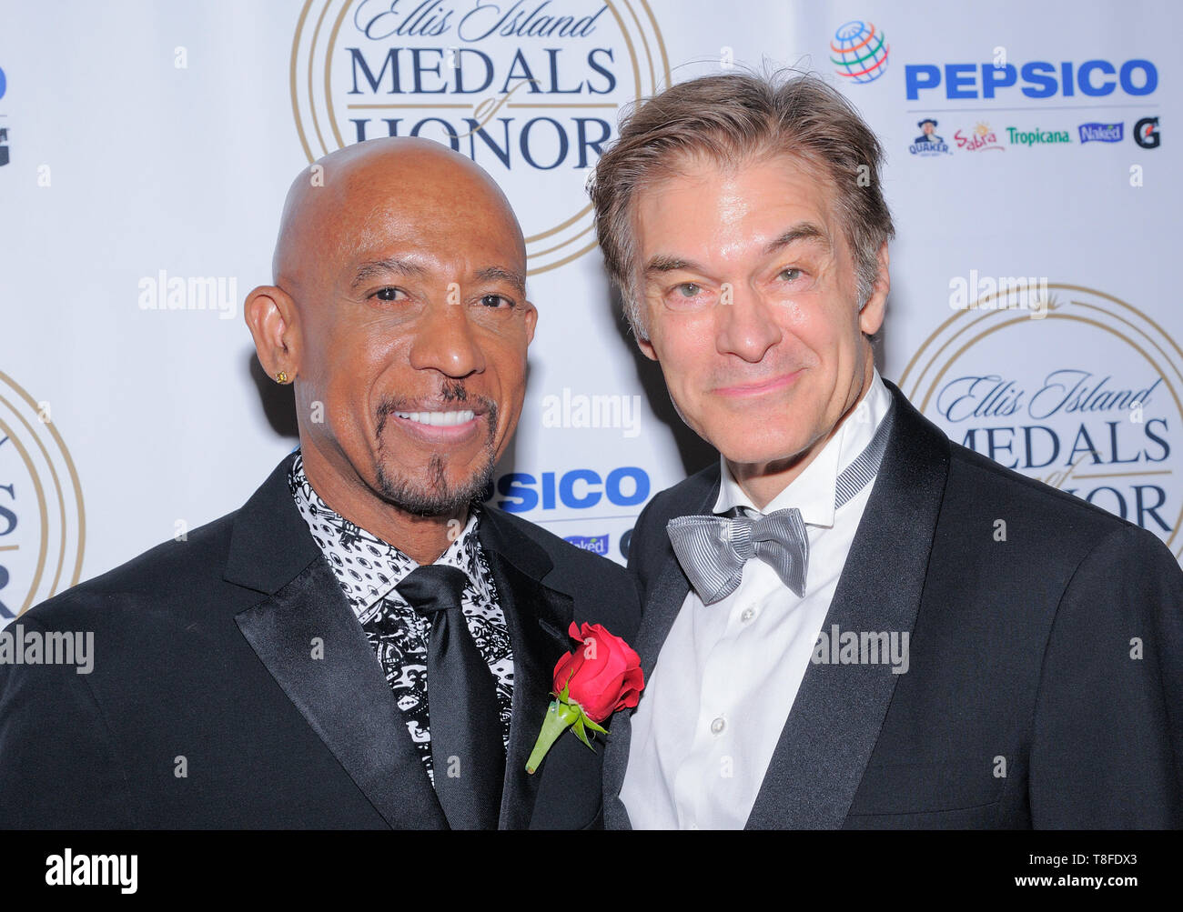 Ellis Island, NY - May 11, 2019: Montel Williams and Mehmet Oz attend the 34th Annual Ellis Island Medals Of Honor Ceremony at Ellis Island Stock Photo