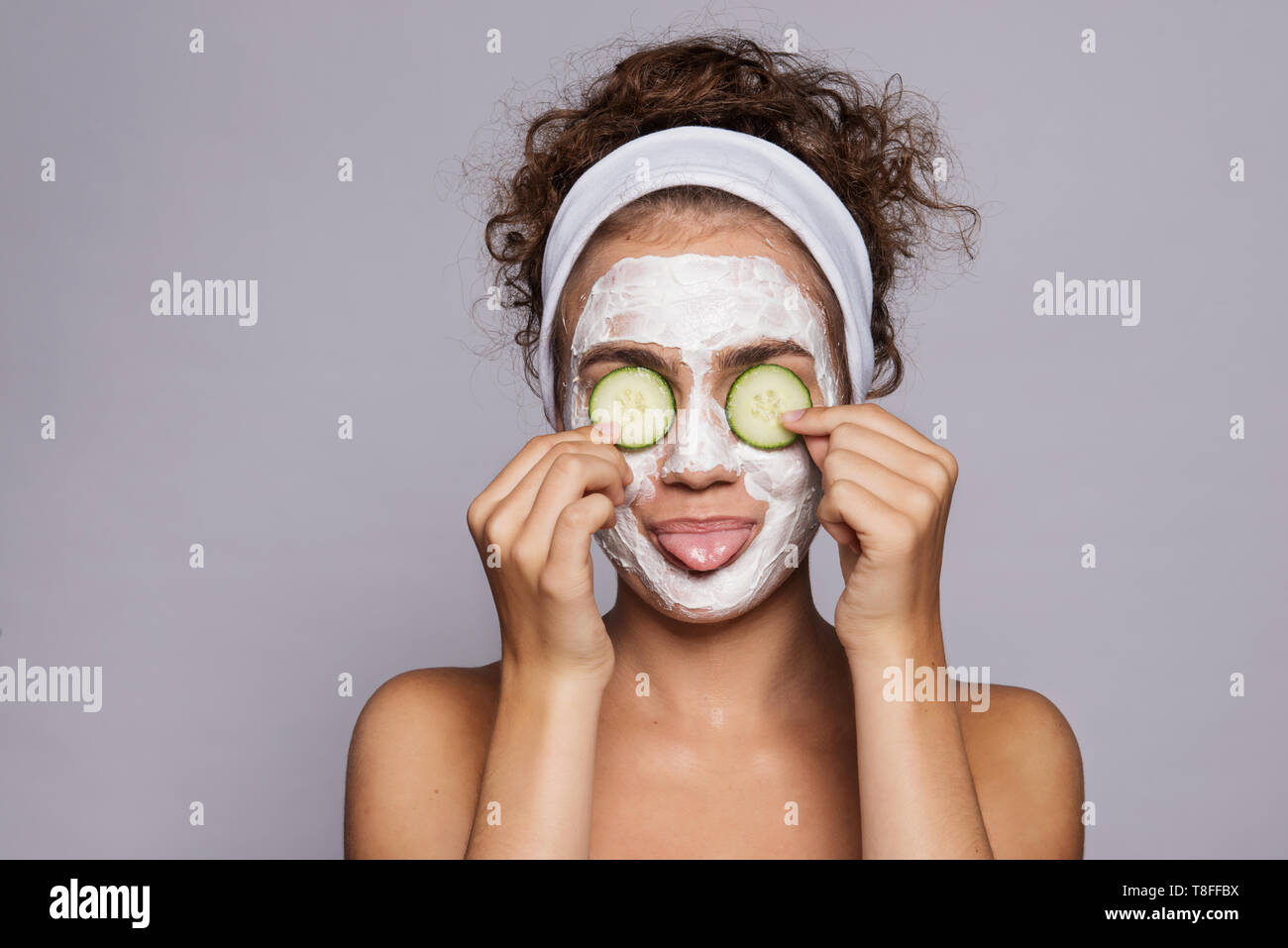A portrait of a young woman with mask in a studio, beauty and skin care. Stock Photo