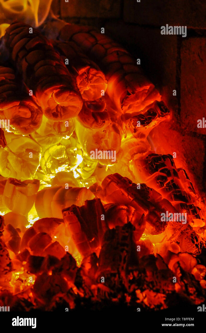 Burning embers in a very hot oven Stock Photo