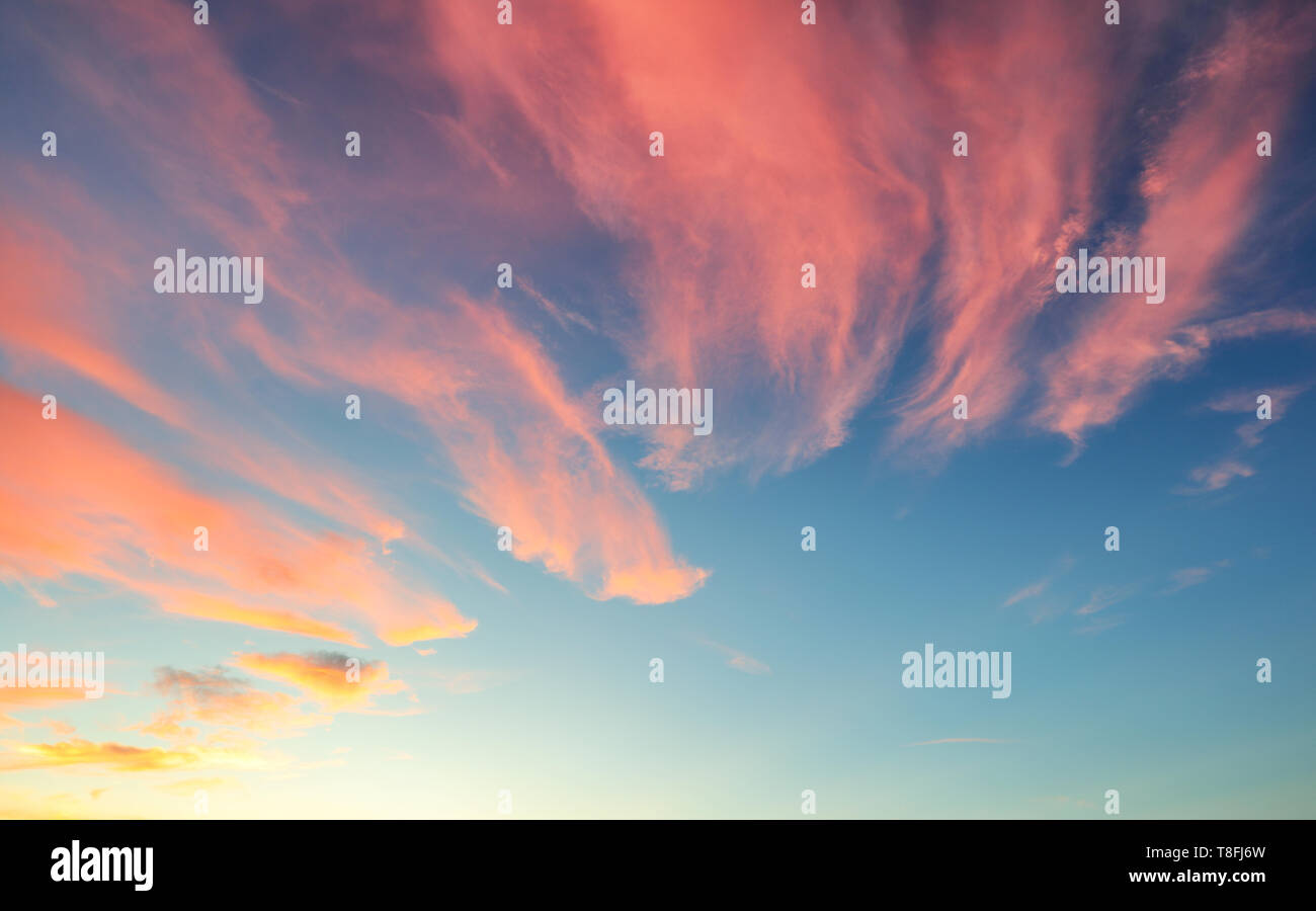 Red sky with blue clouds Stock Photo
