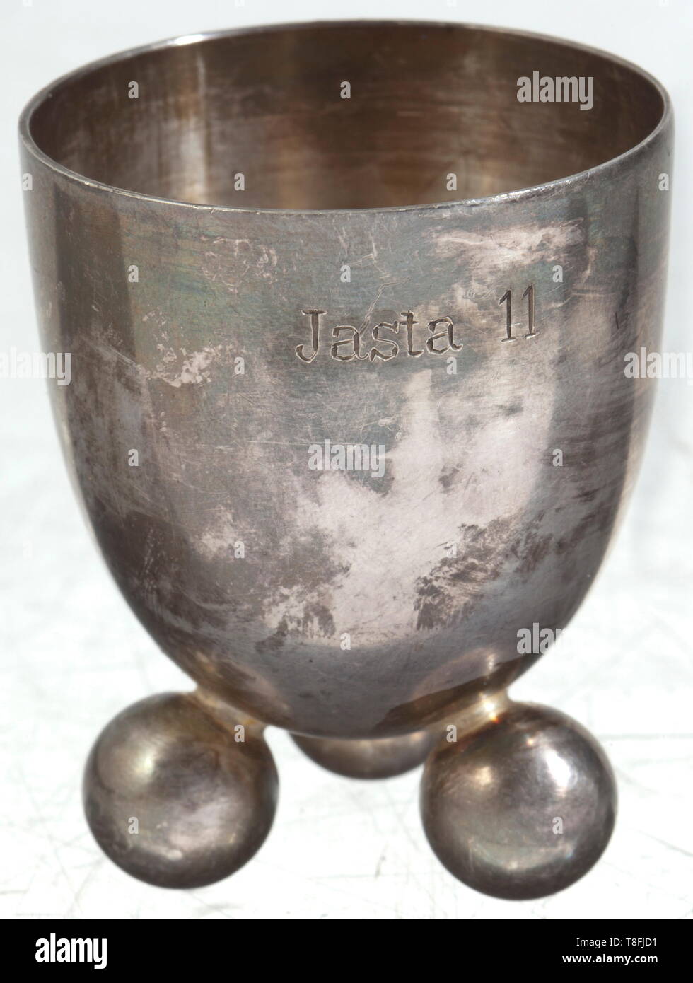 Five victory beakers of JASTA 11 Silver-plated, semi-elliptical cups (WMF) on ball feet, each engraved with 'Dem Sieger im Luftkampf' and 'Jasta 11'. Height of each 5 cm. Some of the most successful fighter pilots of the First World War served in the legendary JASTA 11 (Richthofen, Almenröder, Wolff). historic, historical, troop, troops, armed forces, military, militaria, army, wing, group, air force, air forces, 20th century, Editorial-Use-Only Stock Photo
