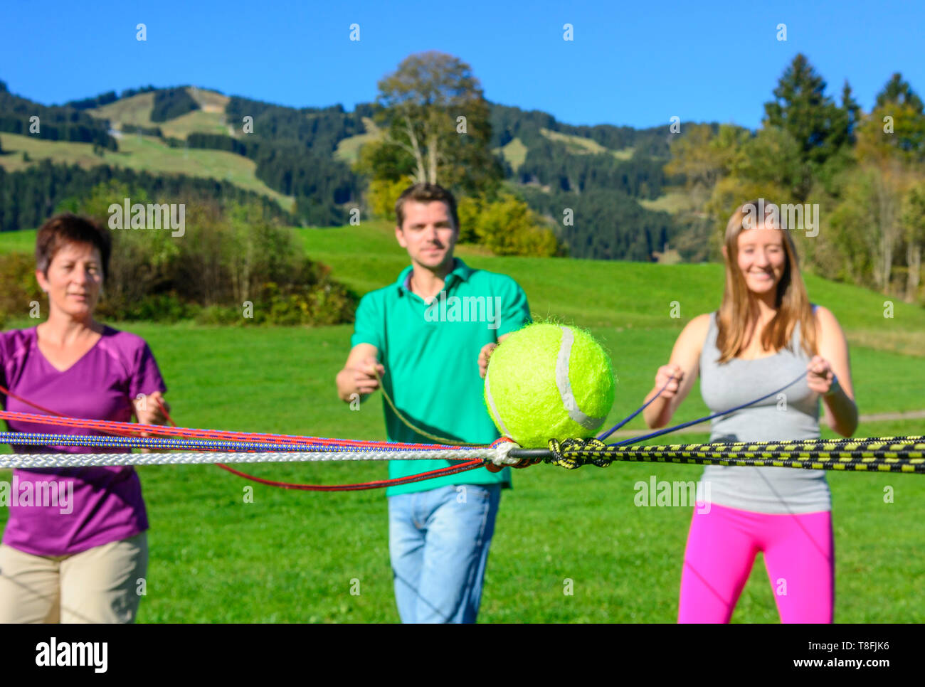 Teambuilding exercise called ball transport Stock Photo Alamy