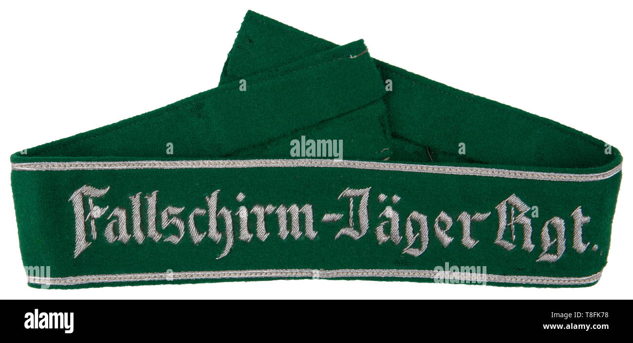 A 'Fallschirm-Jäger Reg.' officer's cuff title Hand-embroidered aluminium thread lettering with aluminium Russia-braid edging on 'jägergrün' green cloth. Length 47 cm. USA-Los historic, historical, Air Force, branch of service, branches of service, armed service, armed services, military, militaria, air forces, object, objects, stills, clipping, clippings, cut out, cut-out, cut-outs, 20th century, Editorial-Use-Only Stock Photo