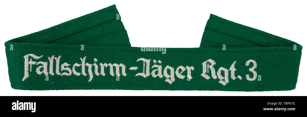 A 'Fallschirm-Jäger Reg.' 3 cuff title for enlisted men Machine-embroidered cotton thread lettering on 'jägergrün' green cloth. USA-Los historic, historical, Air Force, branch of service, branches of service, armed service, armed services, military, militaria, air forces, object, objects, stills, clipping, clippings, cut out, cut-out, cut-outs, 20th century, Editorial-Use-Only Stock Photo