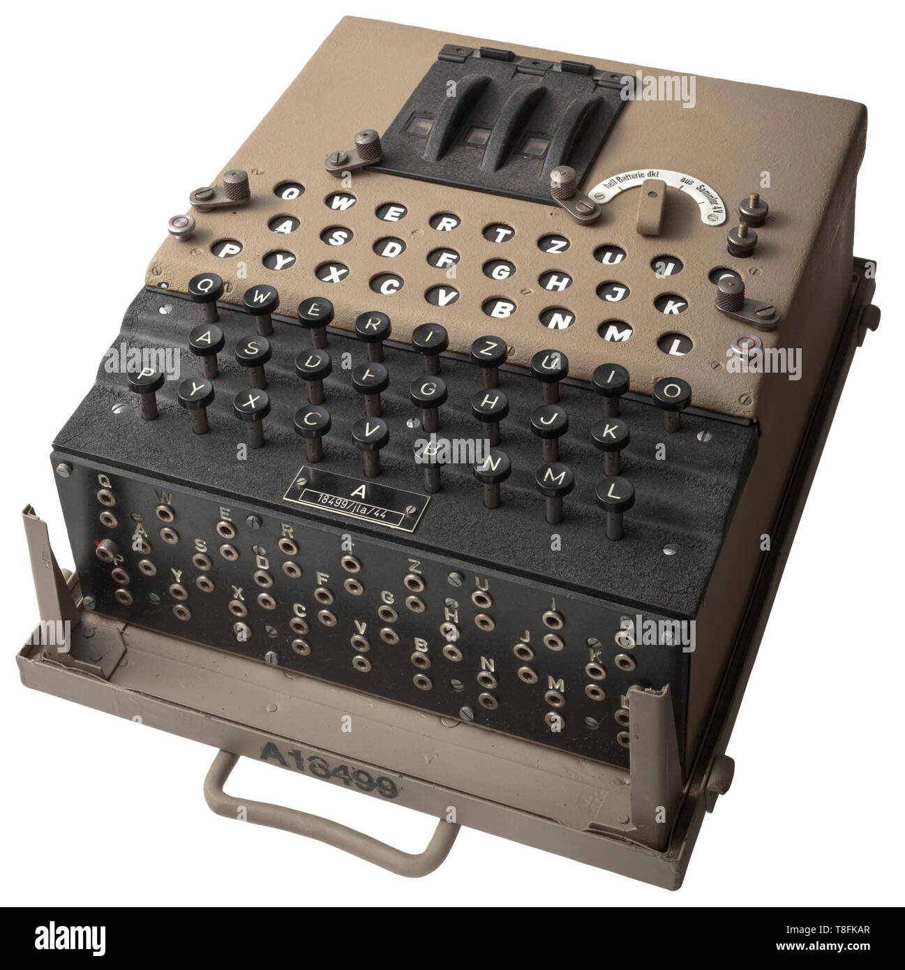 A German cypher machine 'Enigma' of the Wehrmacht with three rotors Iron housing, the folding lid with the lit keyboard, the connections for the external power supply and the alteration switch. Thereunder the three numeric encryption scrambling rotors with the numbers from 1 to 26, the lamp board with the 12 mm light bulbs (incomplete) and the battery compartment. In front of that the keyboard and the plugboard on the front side. No substitute plugs. In the removable vehicle storage box for the intelligence mounting frame, for example for the intelligence Kübelwagen Sd.Kfz., Editorial-Use-Only Stock Photo