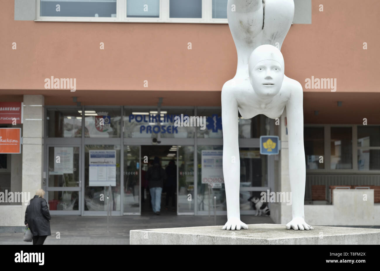 Prague / Czech Republic - May 6 2019: Statue of a dancing/gymnast girl in front of Health Center (Poliklinika) Prosek Stock Photo