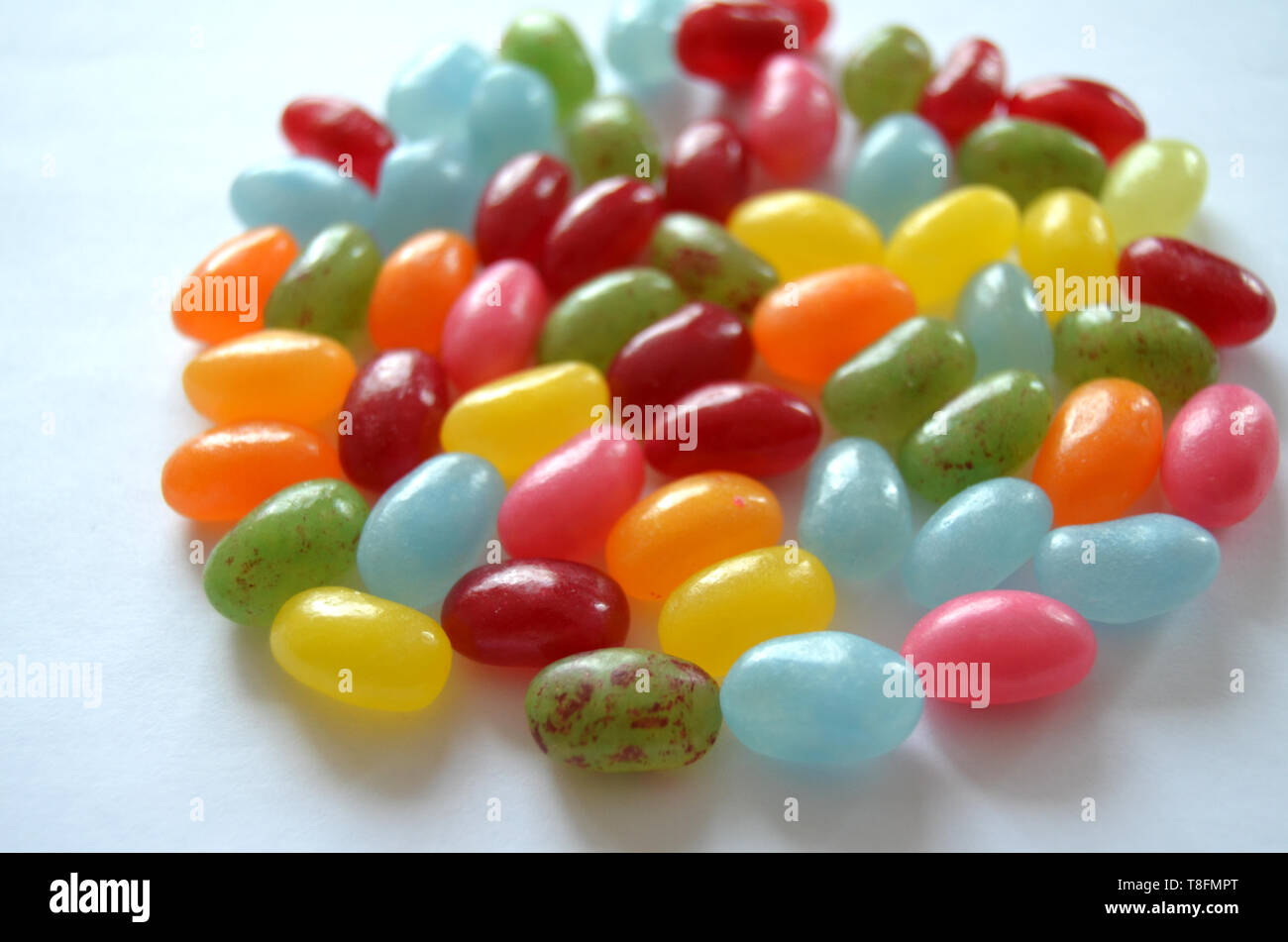 Assorted sweet and sour colorful jelly beans candies with different