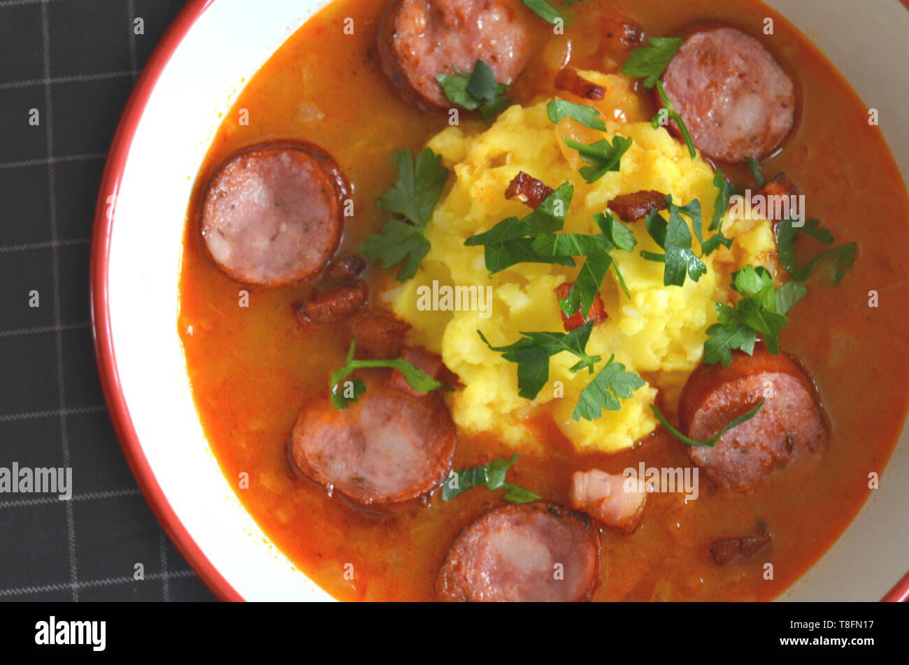 Traditional czech cabbage or sauerkraut soup zelnacka with spicy