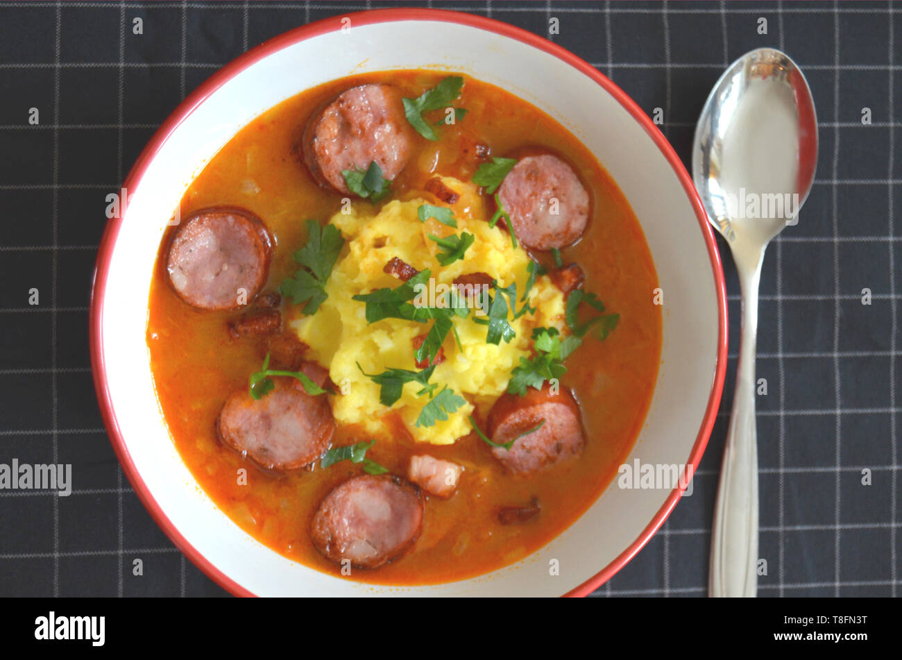 Traditional czech cabbage or sauerkraut soup zelnacka with spicy