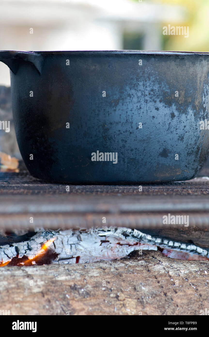 Authentic Jamaican cooking wood fired stove with a pot Stock Photo