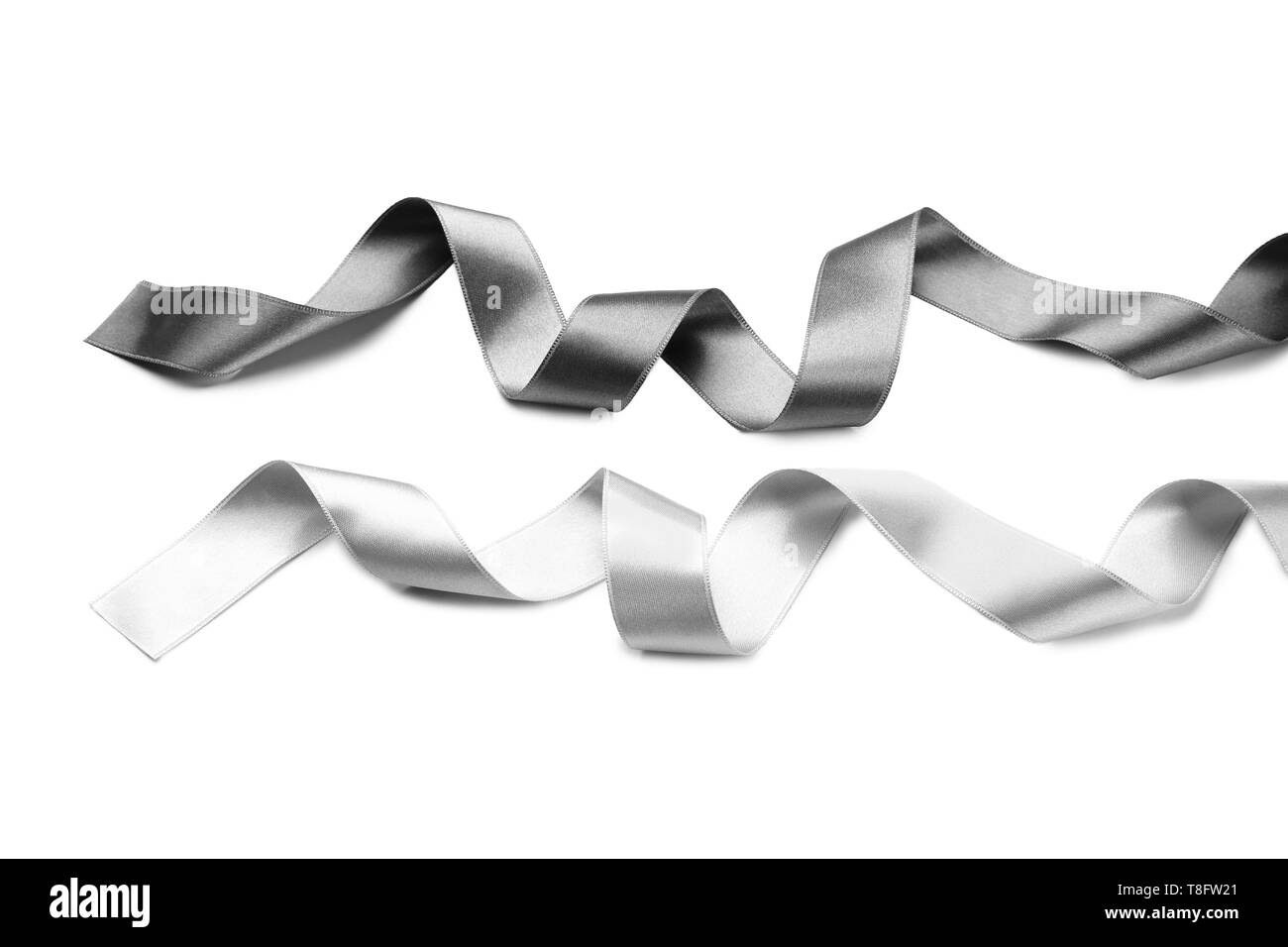 Silver ribbons on white background Stock Photo - Alamy