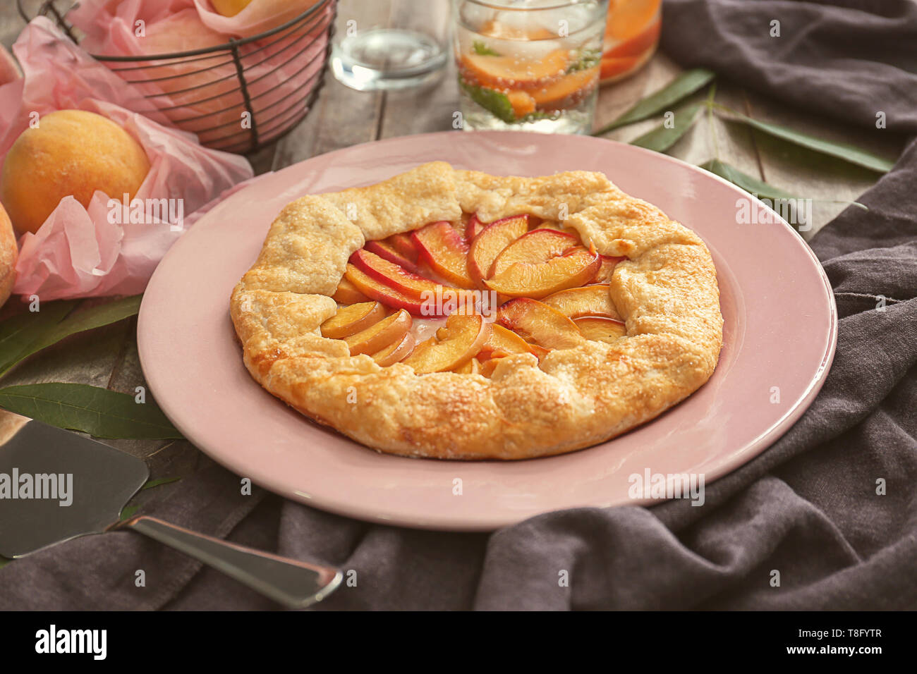 Delicious peach galette on plate Stock Photo
