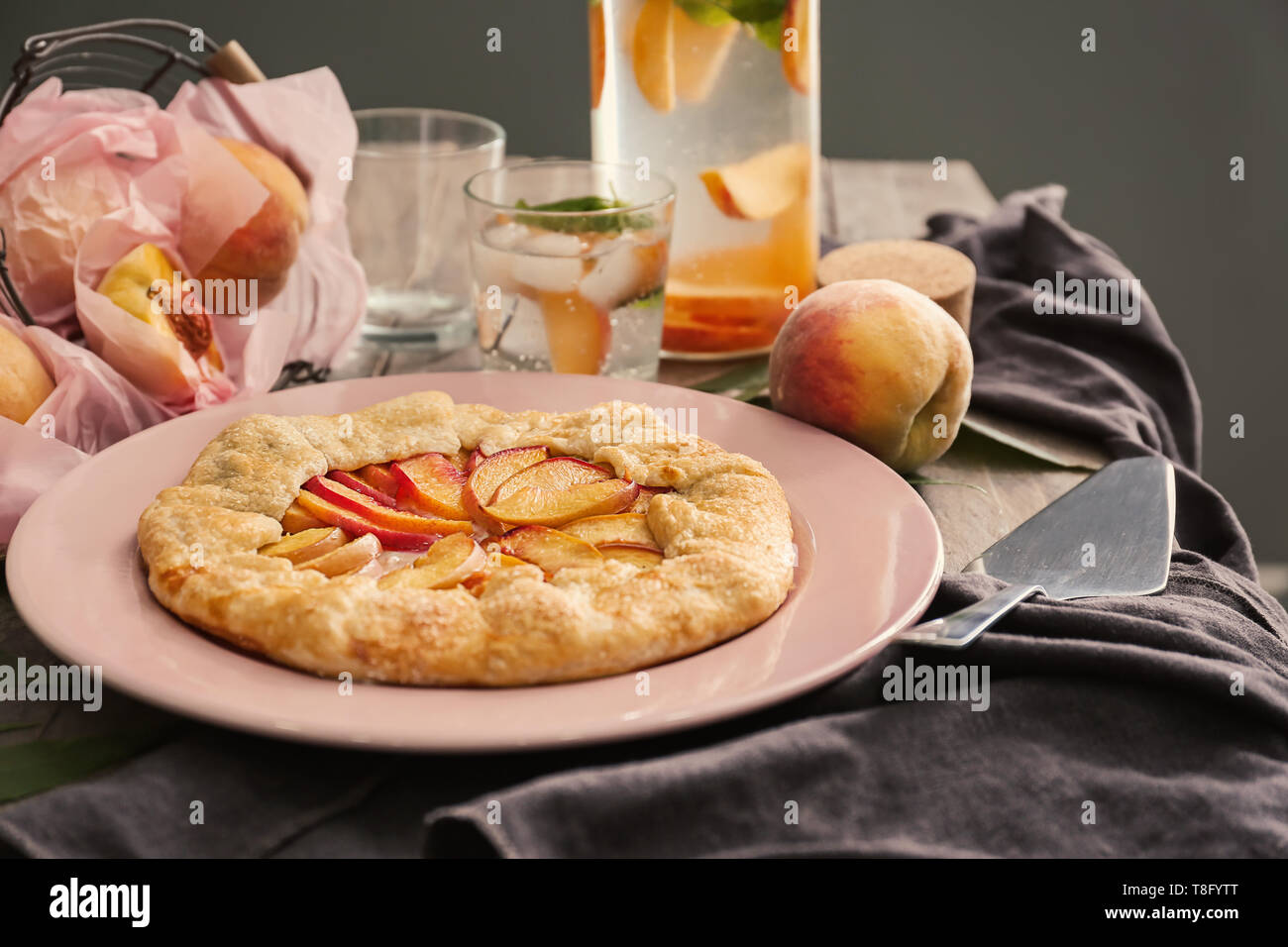 Delicious peach galette on plate Stock Photo