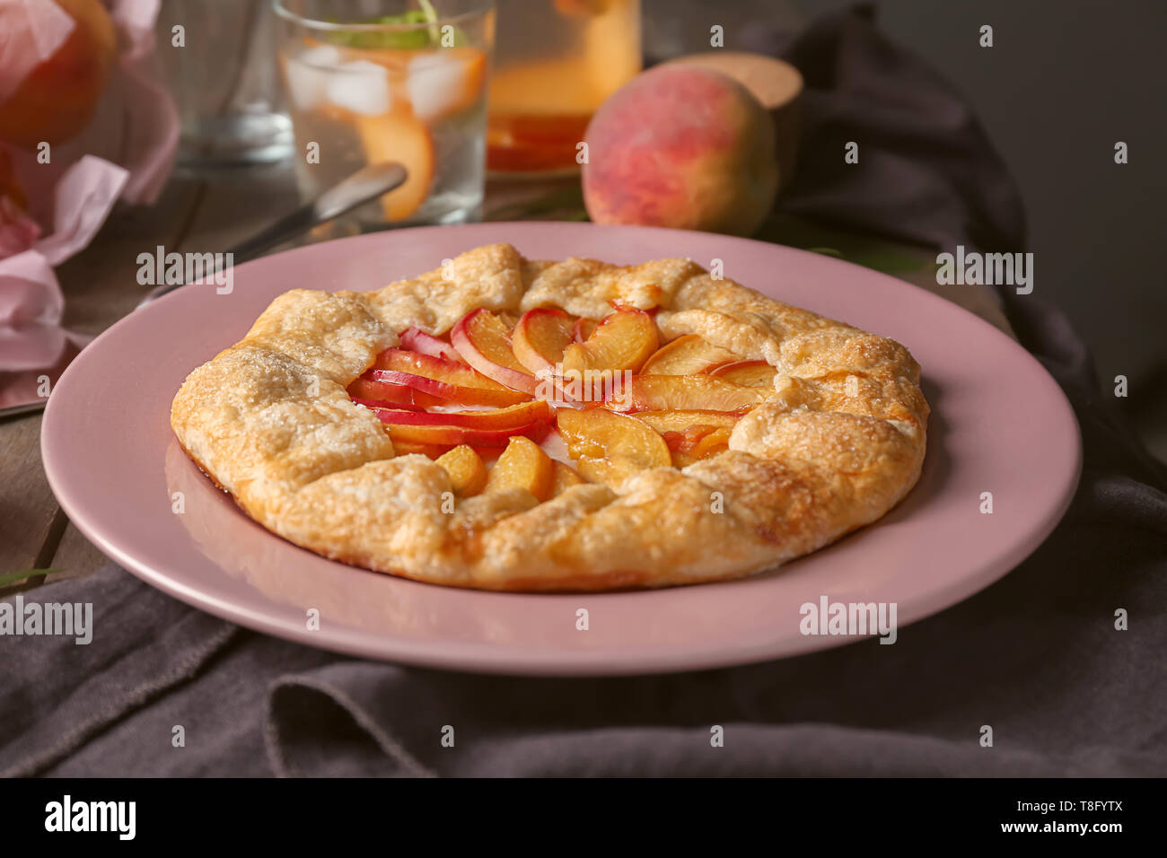 Delicious peach galette on plate Stock Photo