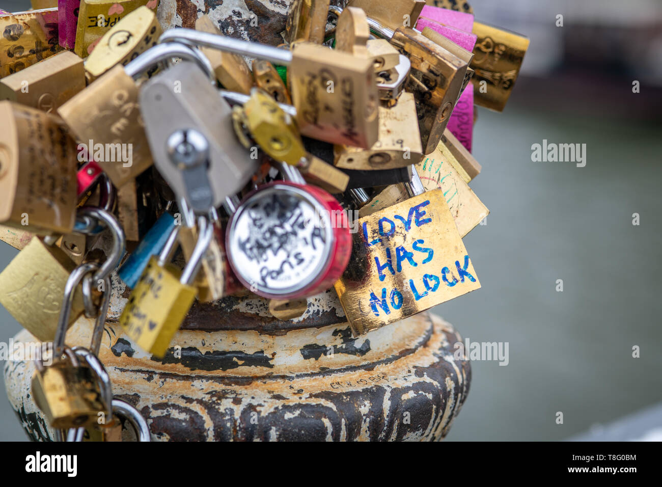 Locks lining the Pont des Arts bridge , also known as the Love Locks Bridge, Paris, FrancePont des Arts bridge , also known as the Love Locks Bridge   Stock Photo