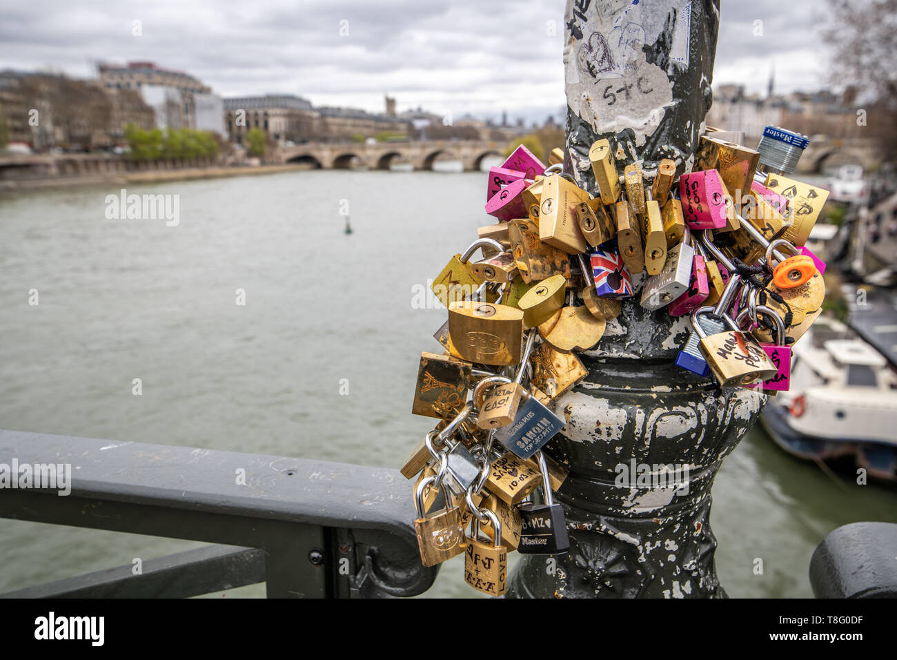 Locks lining the Pont des Arts bridge , also known as the Love Locks Bridge, Paris, FrancePont des Arts bridge , also known as the Love Locks Bridge   Stock Photo