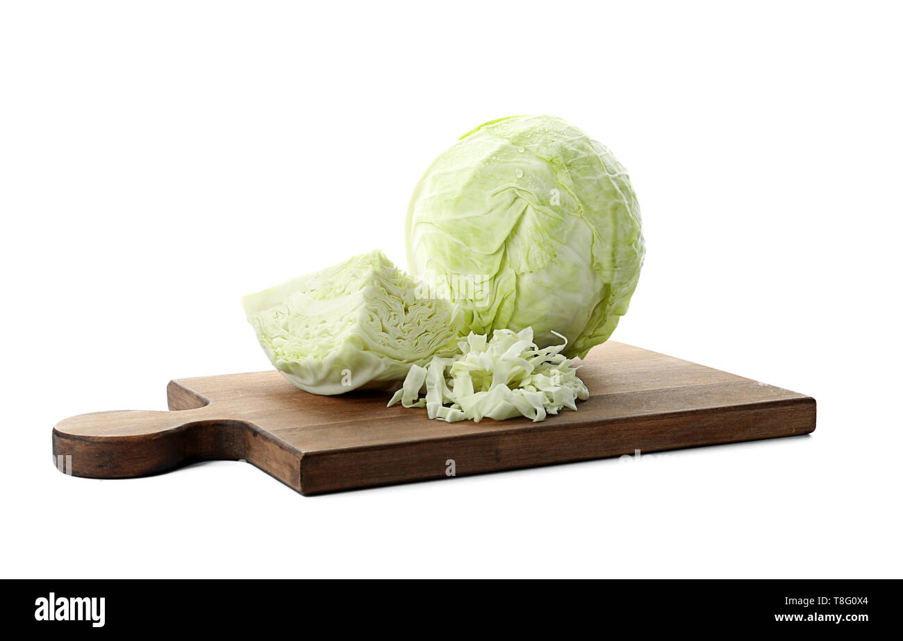 Wooden board with whole and sliced cabbage on white background Stock ...