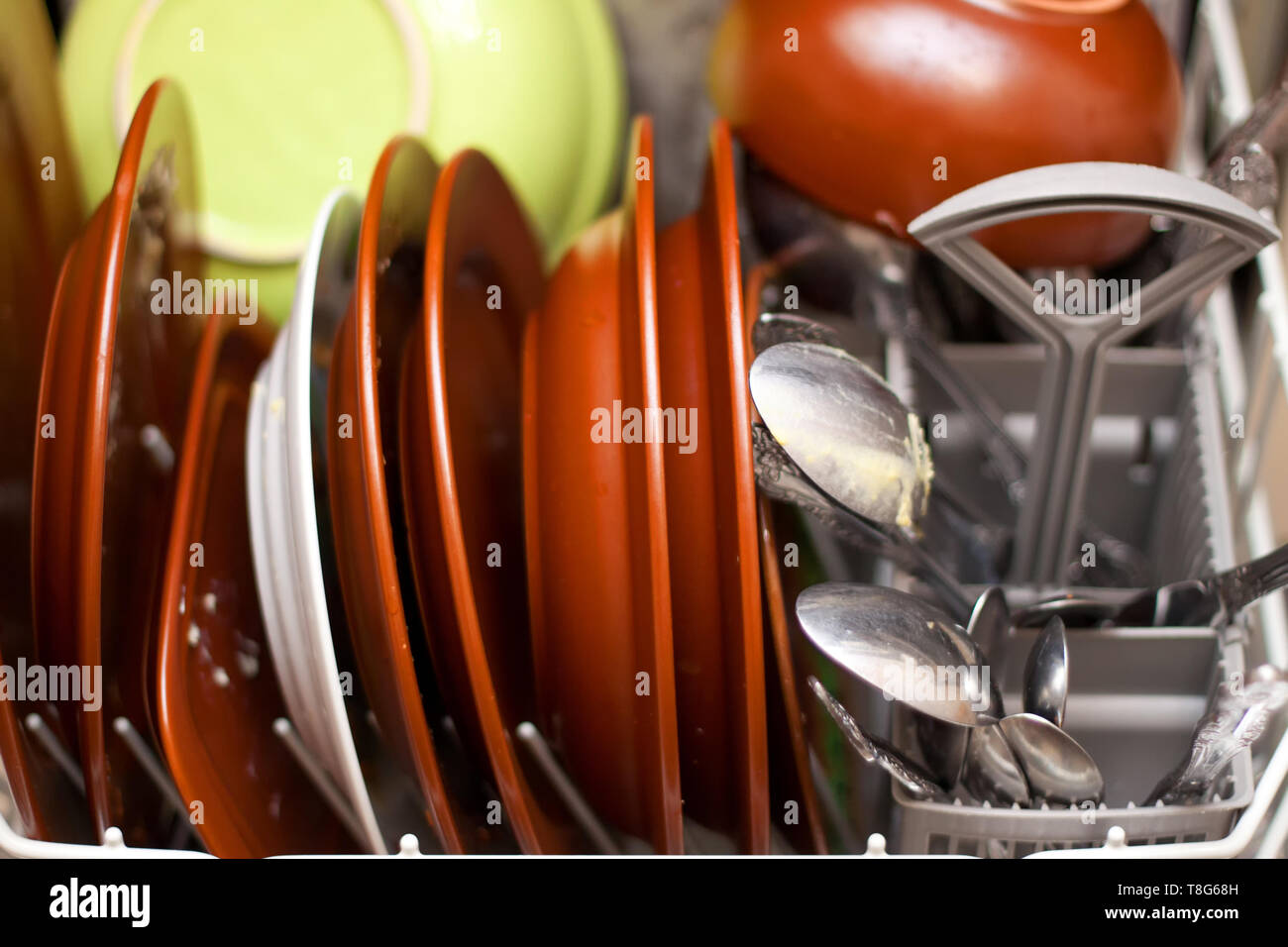 Very dirty dishes in the dishwasher Stock Photo Alamy