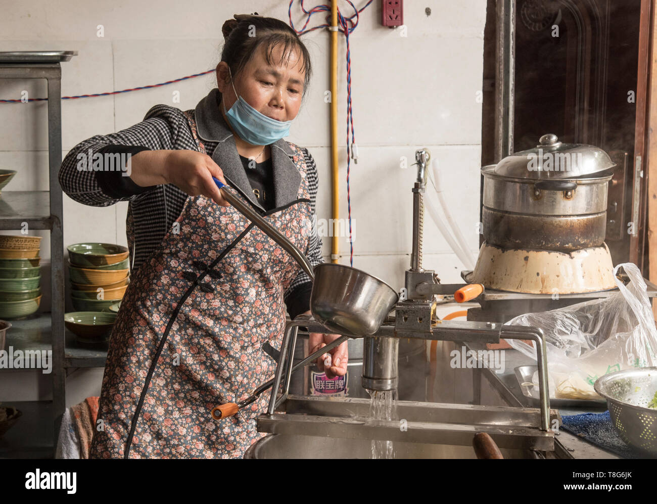Chinese Street food. Food vendor sells food at a stall in Sichuan