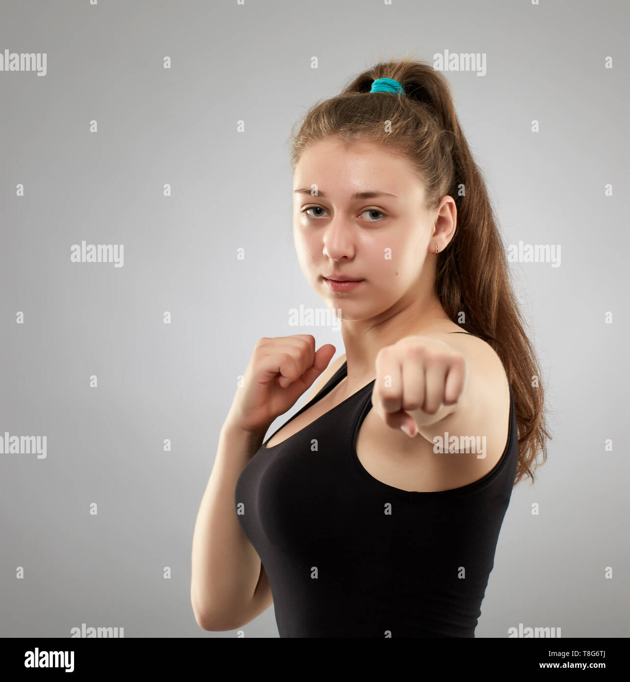Female bare knuckle fighter on gray background Stock Photo Alamy