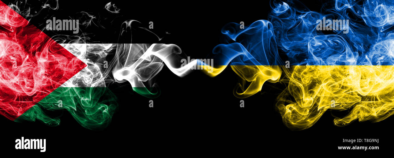 Palestine vs Ukraine, Ukrainian smoky mystic flags placed side by side. Thick colored silky smokes flag of Palestinians and Ukraine, Ukrainian. Stock Photo