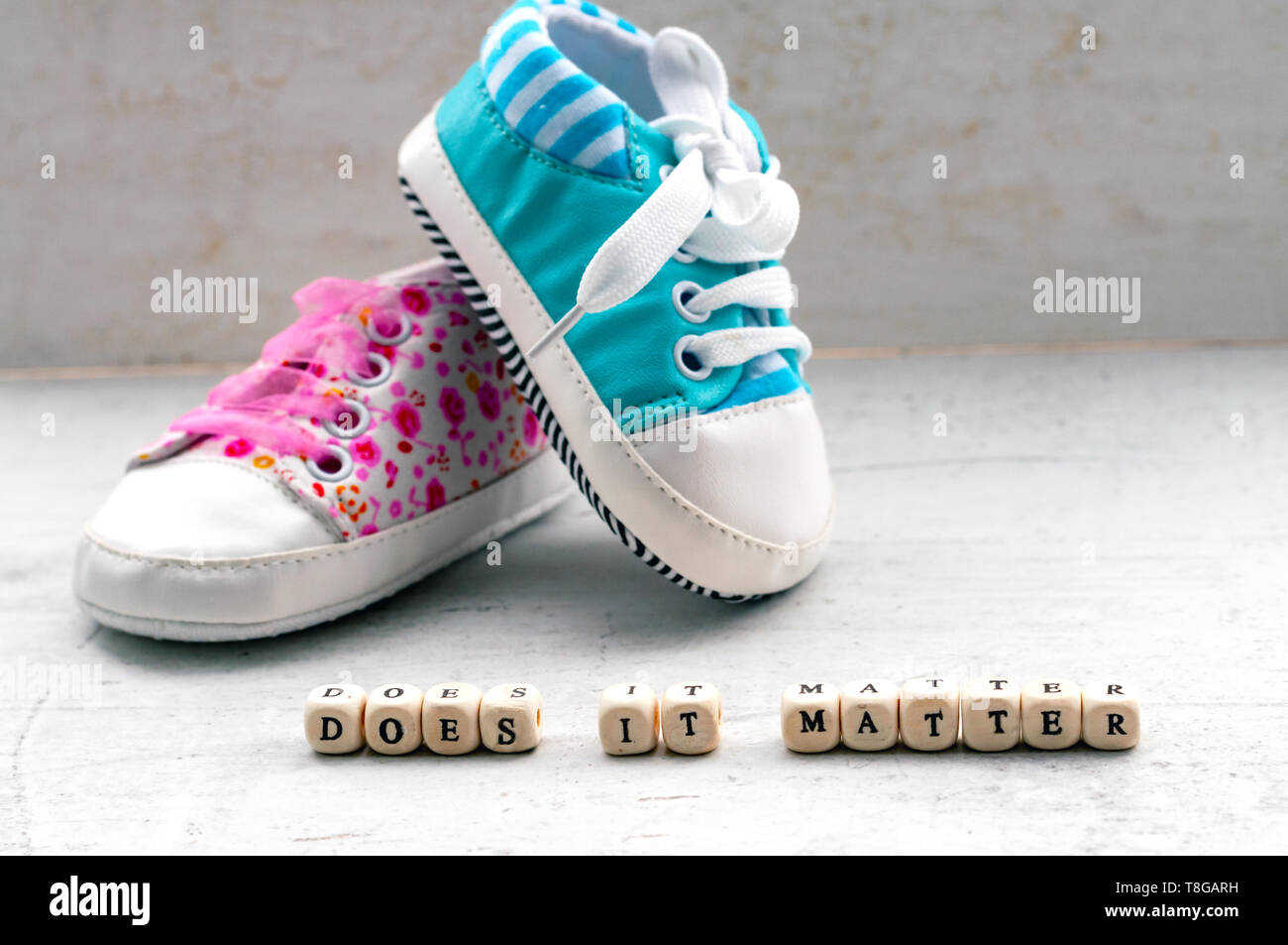 pink and blue baby shoes