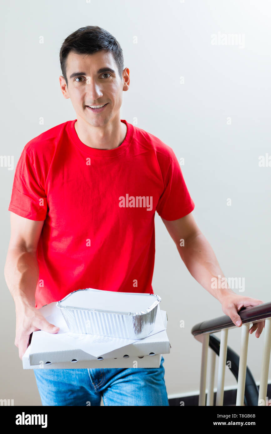 Pizza delivery man hires stock photography and images Alamy