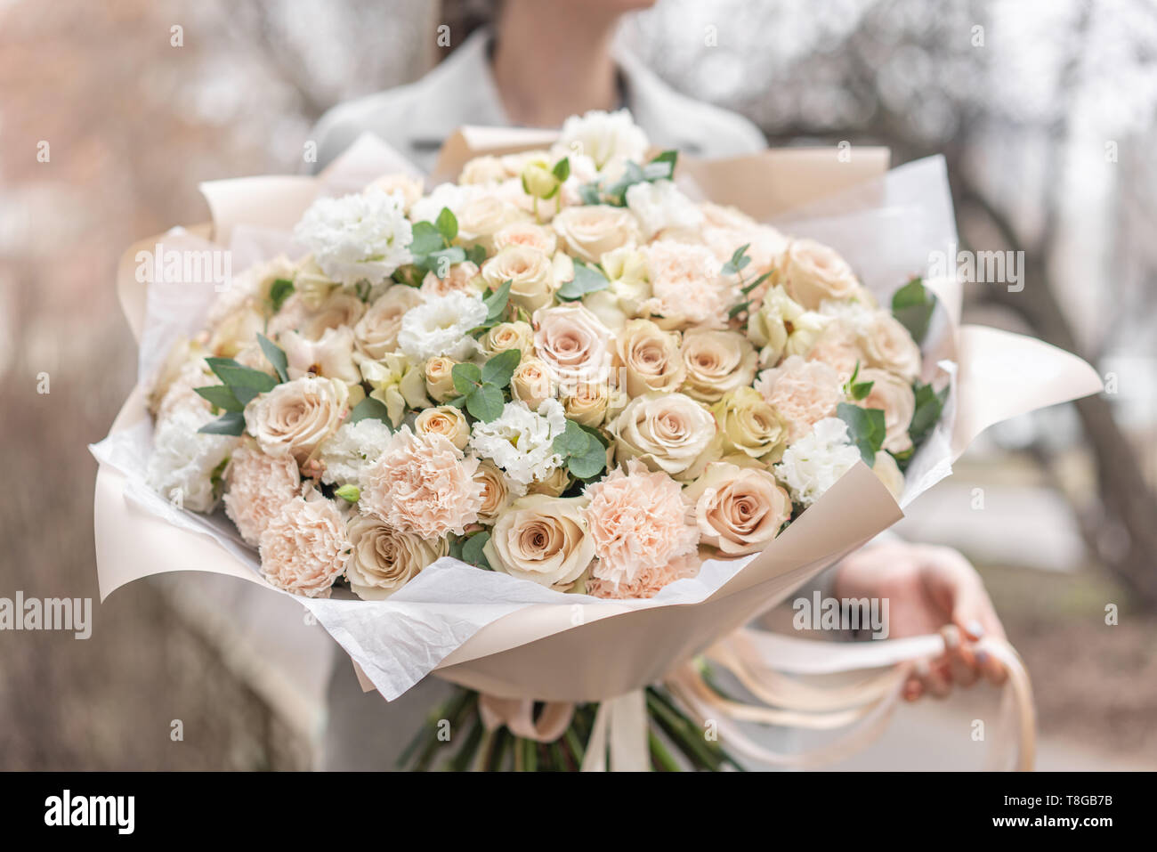 Large Beautiful Bouquet Of Mixed Flowers In Woman Hand Pink