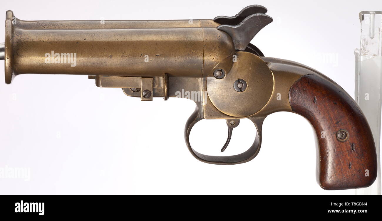 A double-barrelled signal flare pistol ('Model Submarine') of the imperial navy Cal. 4, no. 99. Matching numbers. Drop barrels with muzzle ridge, bright bores, locked by way of a spring-mounted, ribbed brass opening slide which can be used on both sides. Barrel lengths 133 mm. Total length 260 mm. Weight 2340 g. On pommel marked 'ST & B / 16' which stands for 1916 manufacture at Stantien & Becker's, Lübeck. Brass grip frame and double barrels. The ribbed trigger and both strong, ribbed hammers have a distinct spur to be cocked individually for ea, Additional-Rights-Clearance-Info-Not-Available Stock Photo