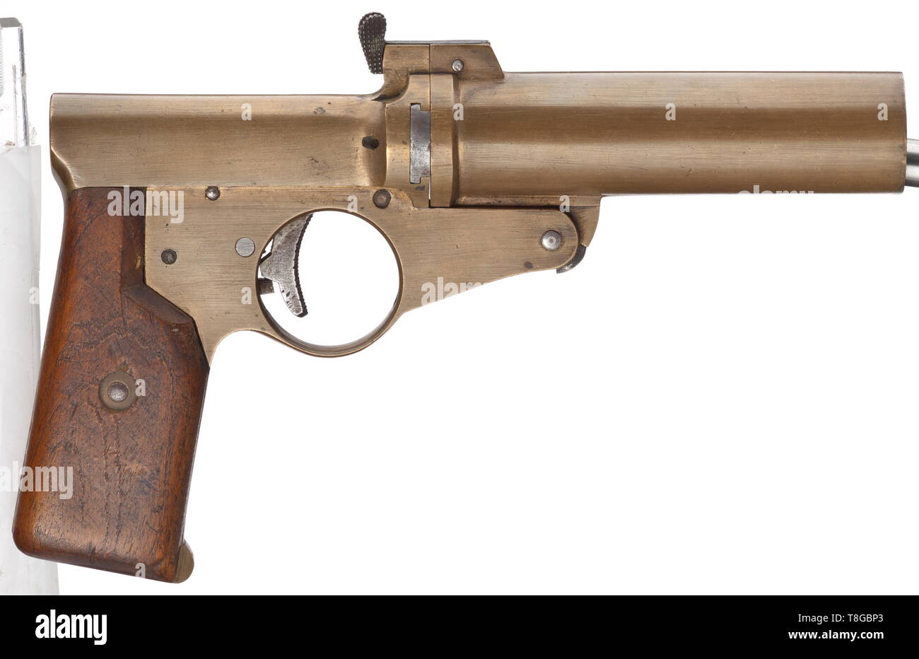 A single-barrelled signal pistol mod. A.W.W, World War I, navy Cal. 4, no. 37. Matching numbers. Drop barrel with snapper lock, length 115 mm. Total length 220 mm. Weight 860 g. Interior hammer. Safety. Signal pin. Construction attributed to Artilleriewerkstätten Wilhelmshaven (A.W.W.). On pommel navy acceptance mark crown/M. No further stamps or inscriptions. Brass grip frame and barrel. Ribbed trigger, opening lever, breech-block, safety, mechanical parts and screws made of steel. Matching-numbered, smooth walnut grip panels. A mostly unknown a, Additional-Rights-Clearance-Info-Not-Available Stock Photo