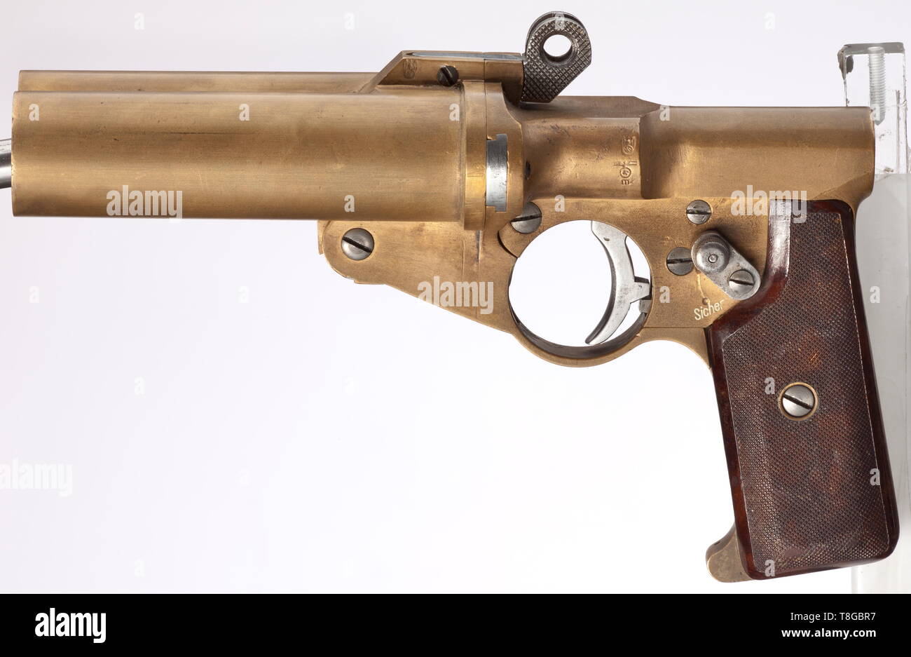 A double-barrelled signal pistol mod. A.W.W, Third Reich, navy Cal. 4, no. 15. Matching numbers. Good drop barrels with snapper locks, length 113 mm. Total length 217 mm. Weight 1300 g. Interior hammer. Safety. Signal pin. No barrel selector button. Construction attributed to Artilleriewerkstätten Wilhelmshaven. Slightly modified model. On left side of barrel latch and on bolt housing navy acceptance marks eagle/swastika/M, on pommel inventory no. '0 388' standing for Baltic Sea Fleet. No further stamps or inscriptions. Brass grip frame and barrels. The smooth trigger, the , Editorial-Use-Only Stock Photo