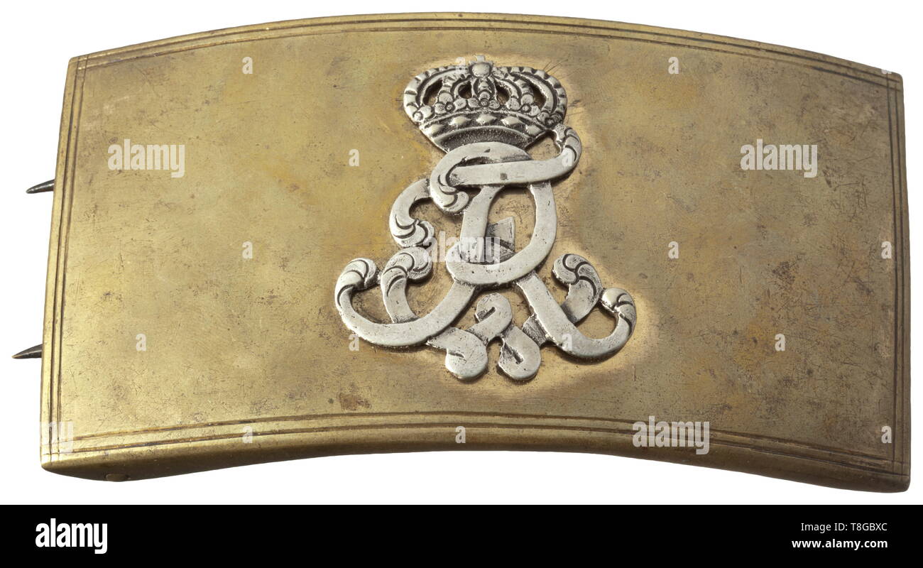 A Friedrich Wilhelm of Prussia belt buckle Solid brass, curved with applied crowned cypher 'FWR', the reverse plating attached with two of three star nuts. Of great rarity as a piece of equipment from the Frederician period. With movable double-prong closure. Width 14.5 cm. historic, historical, Prussian, Prussia, German, Germany, militaria, military, object, objects, stills, clipping, clippings, cut out, cut-out, cut-outs, 19th century, Additional-Rights-Clearance-Info-Not-Available Stock Photo